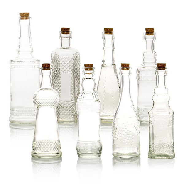 http://www.lunabazaar.com/cdn/shop/products/clear-vintage-glass-bottle-set-glassware-flower-vases_600x.jpg?v=1603772203