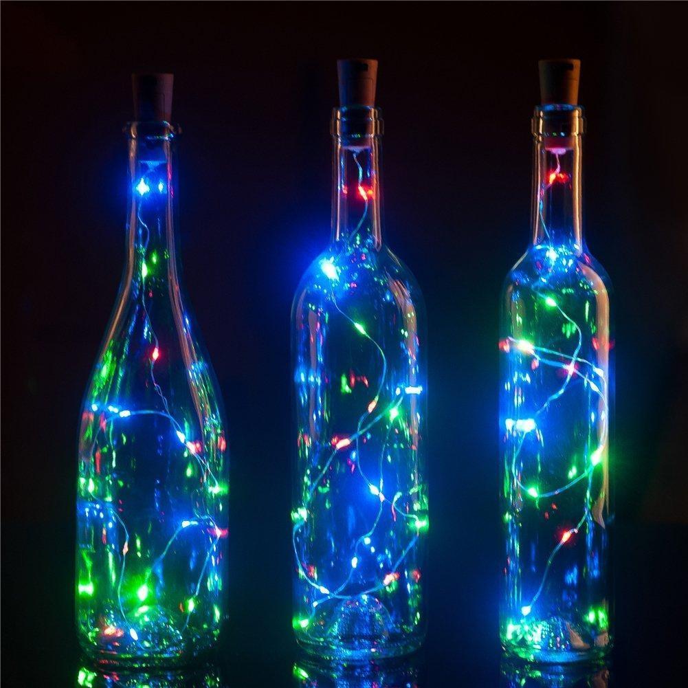 wine bottles with candles (I'd use twinkly lights), centerpiece for a  speakeasy